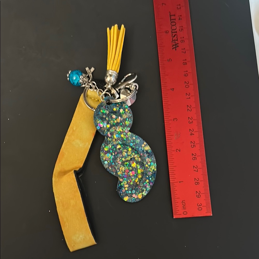 Glittery Bluish Keychain with Yellow Tassel blue stone with yellow hand lanyard